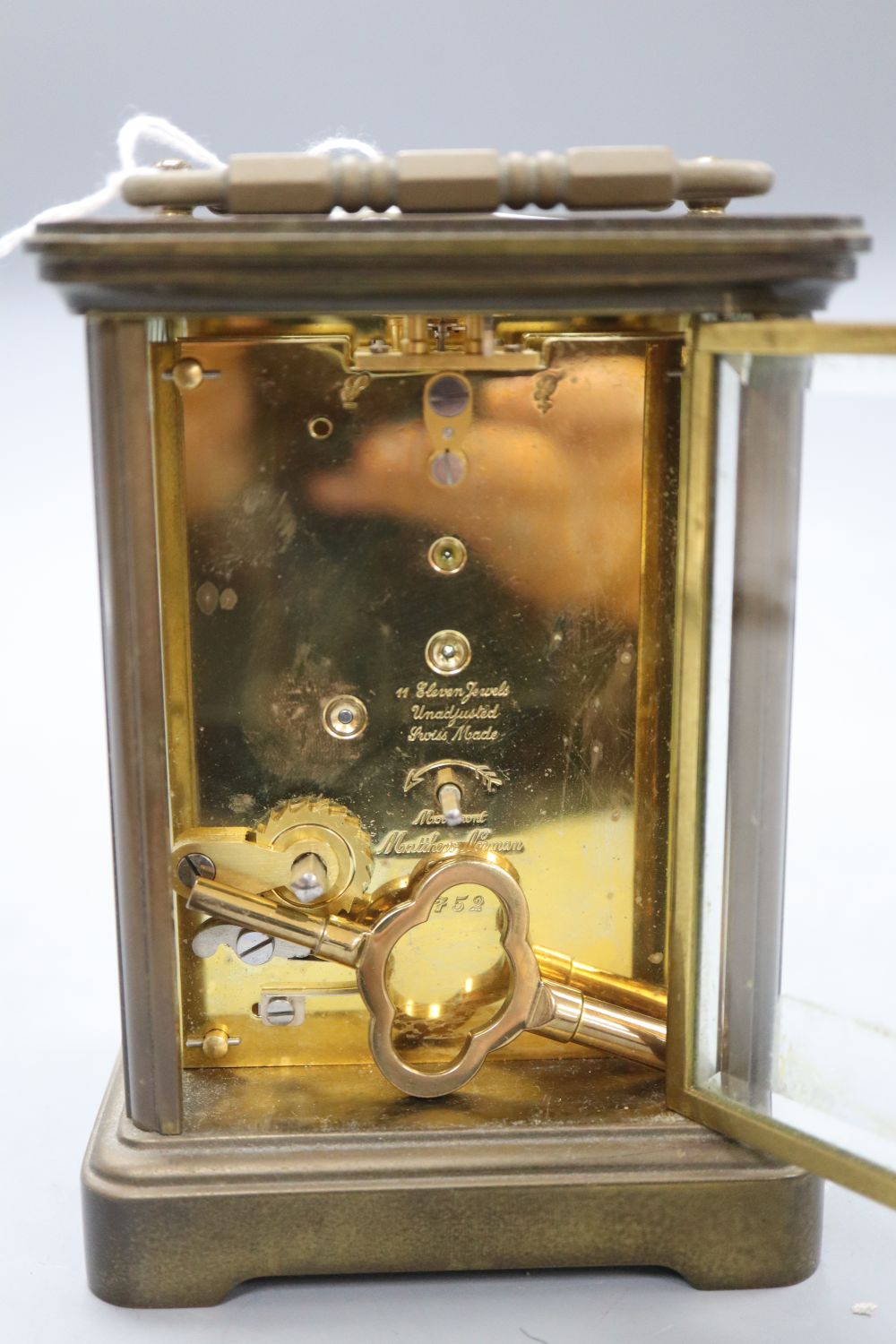 A Matthew Norman brass carriage timepiece, no.1752, height 14cm (handle down)